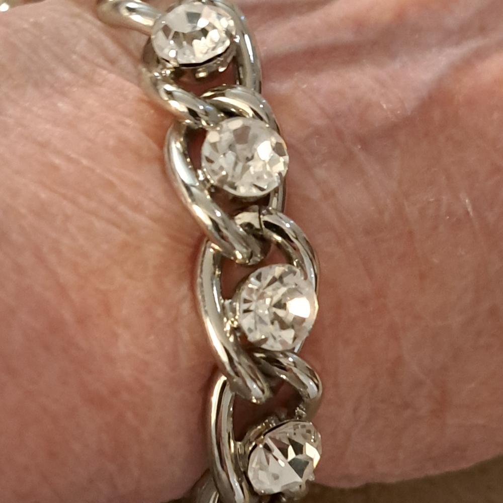 Elegant Silver Tone Cache Bracelet with Clea Stones